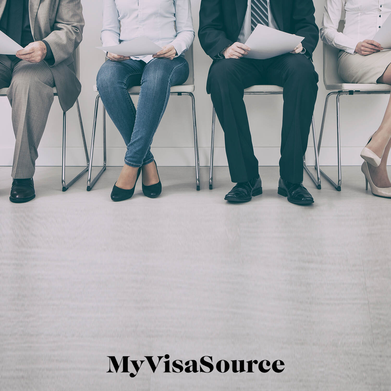 4 people sitting in chairs waiting with resumes in hand my visa source