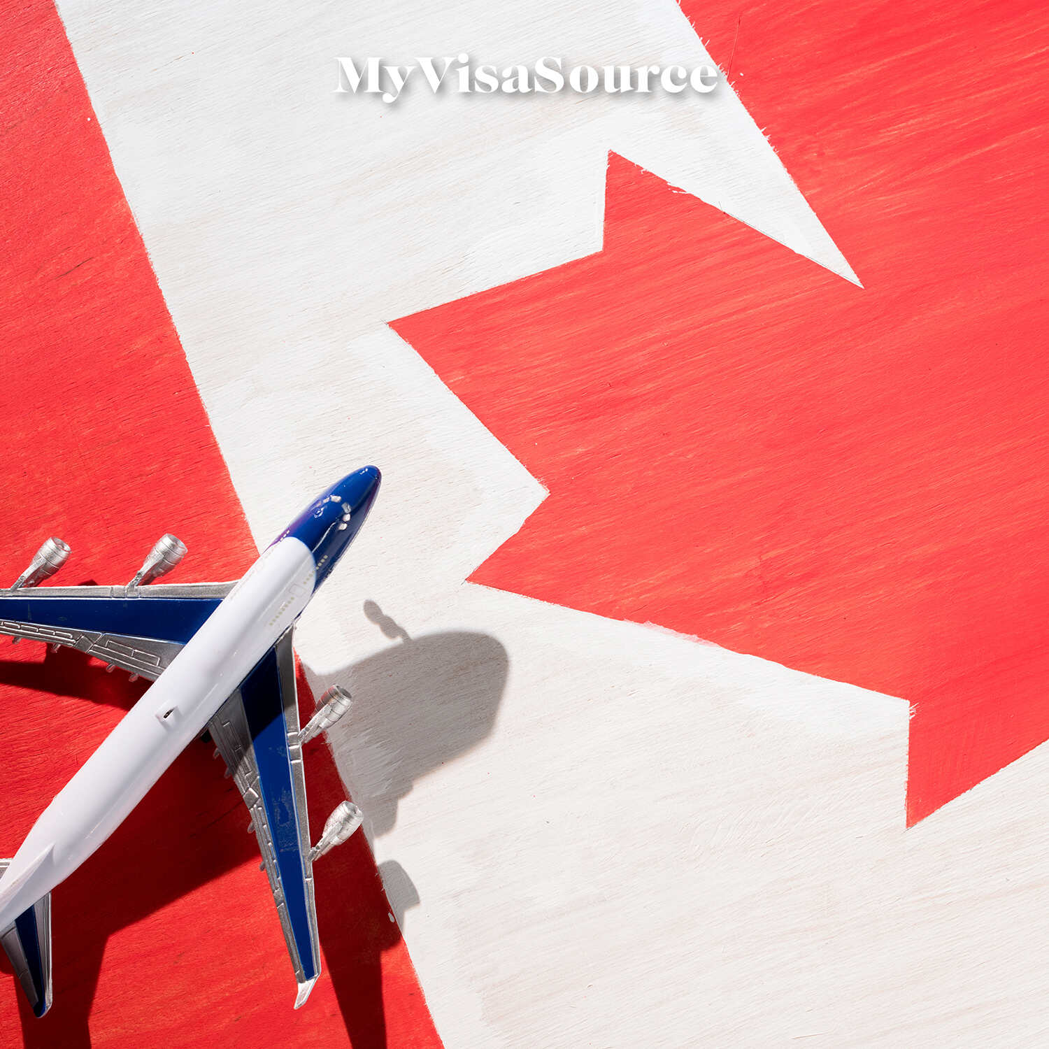 airplane-over-canadian-flag-my-visa-source