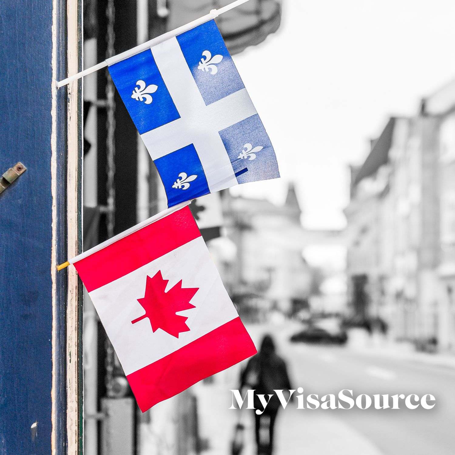 canadian and quebec flags on storefront my visa source