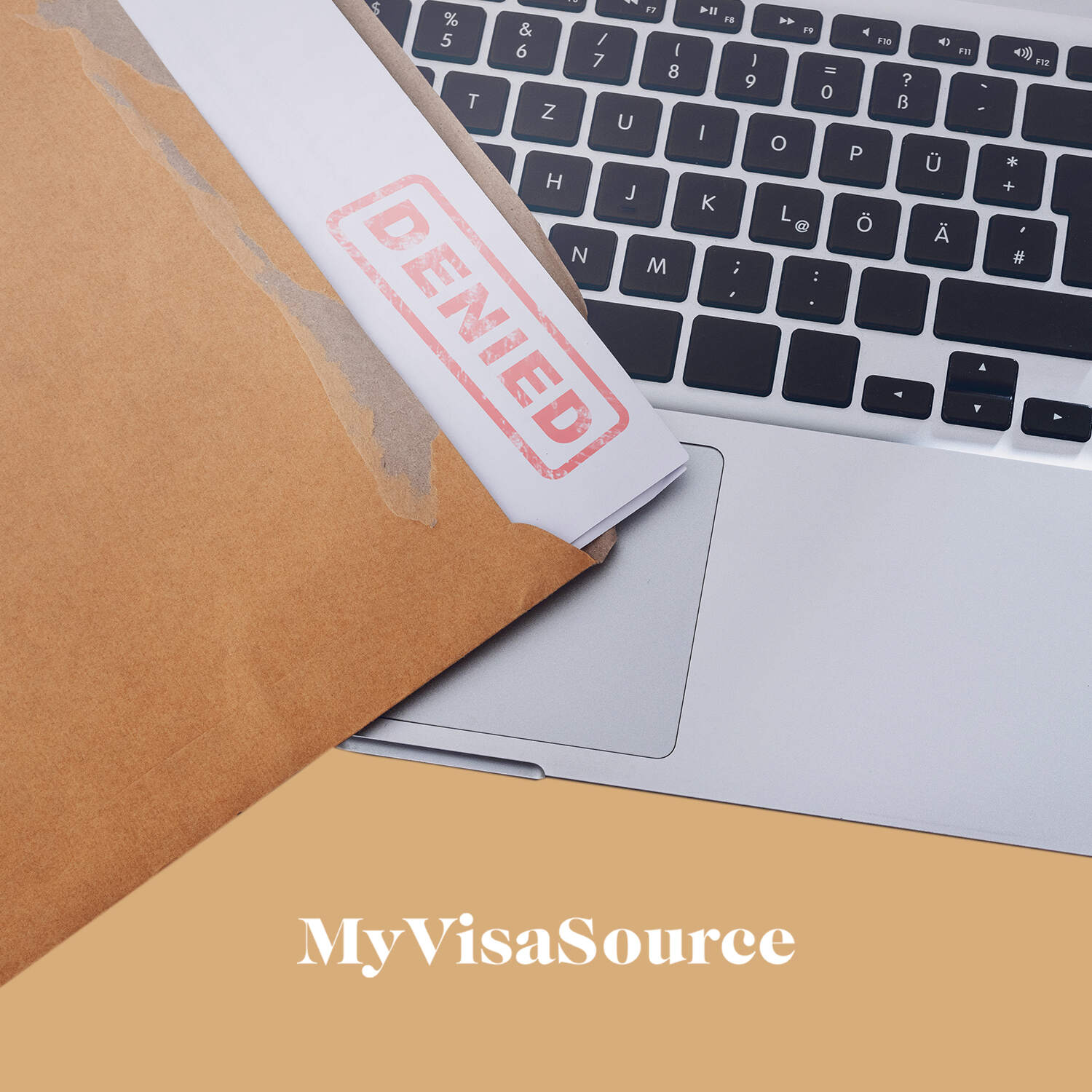 file with denied stamped on it and all on top of laptop my visa source