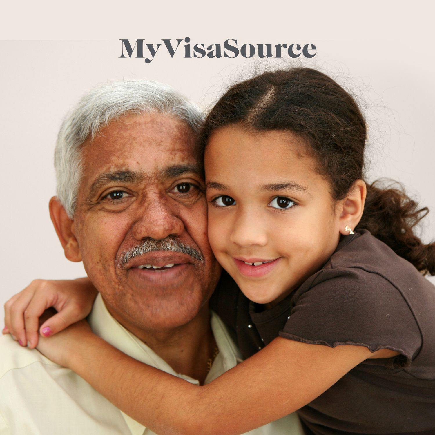 granddaughter holding her grandfather my visa source