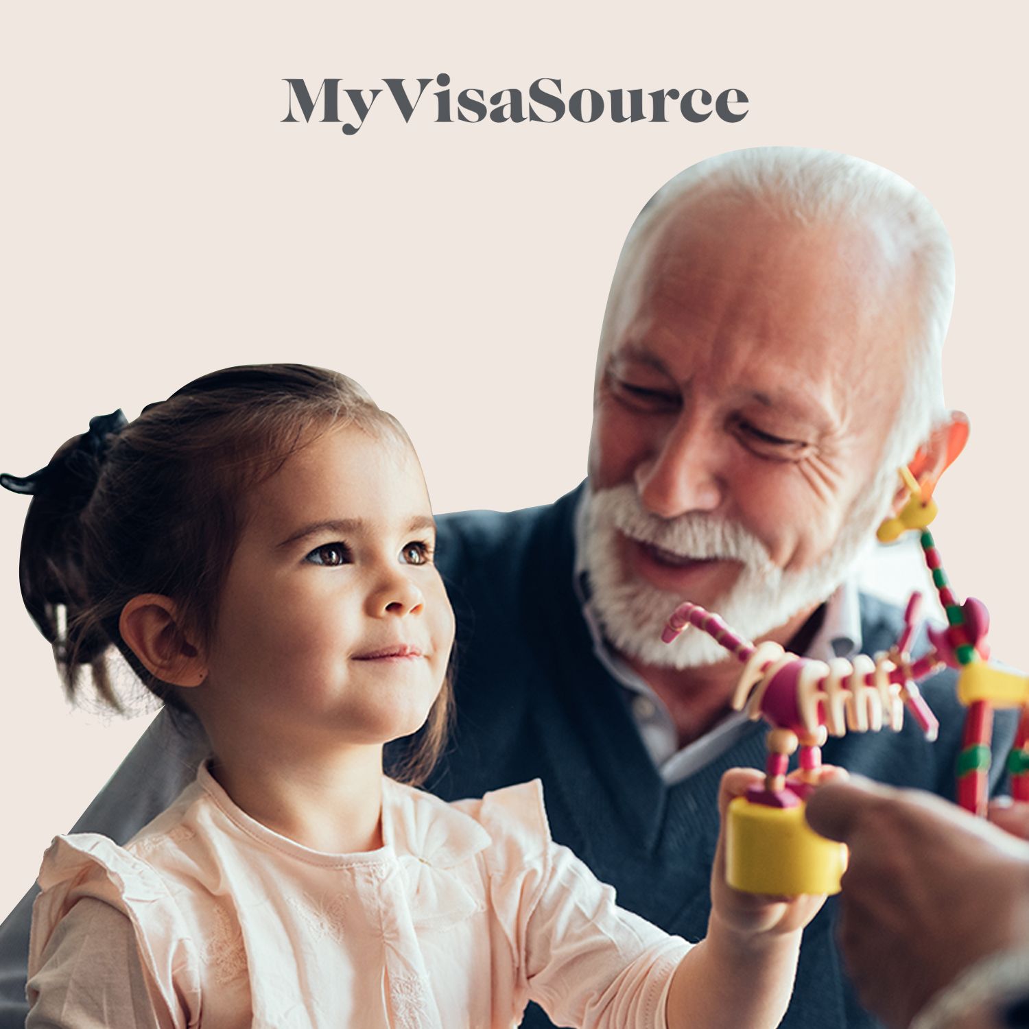 grandfather holding granddaughter playing with a toy my visa source