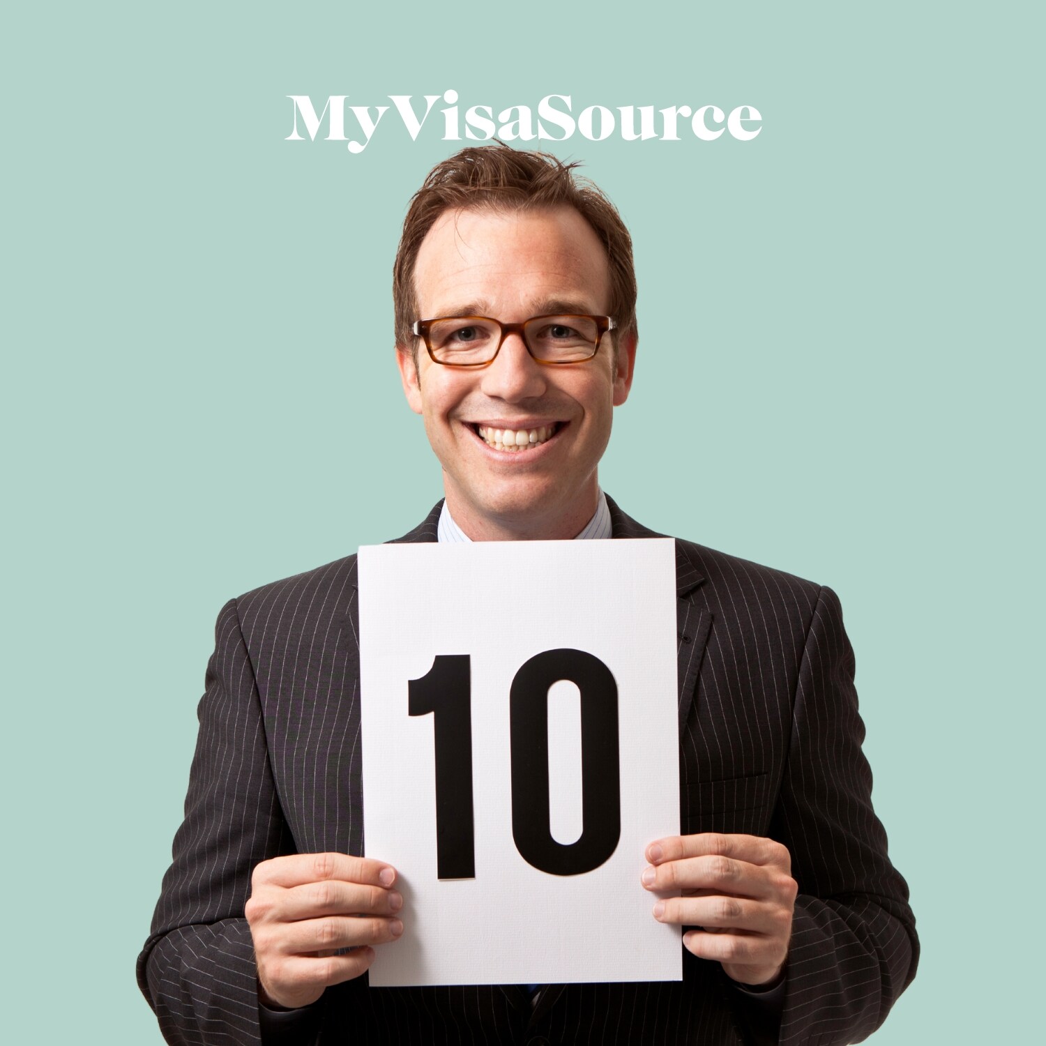 man holding a 10 sign