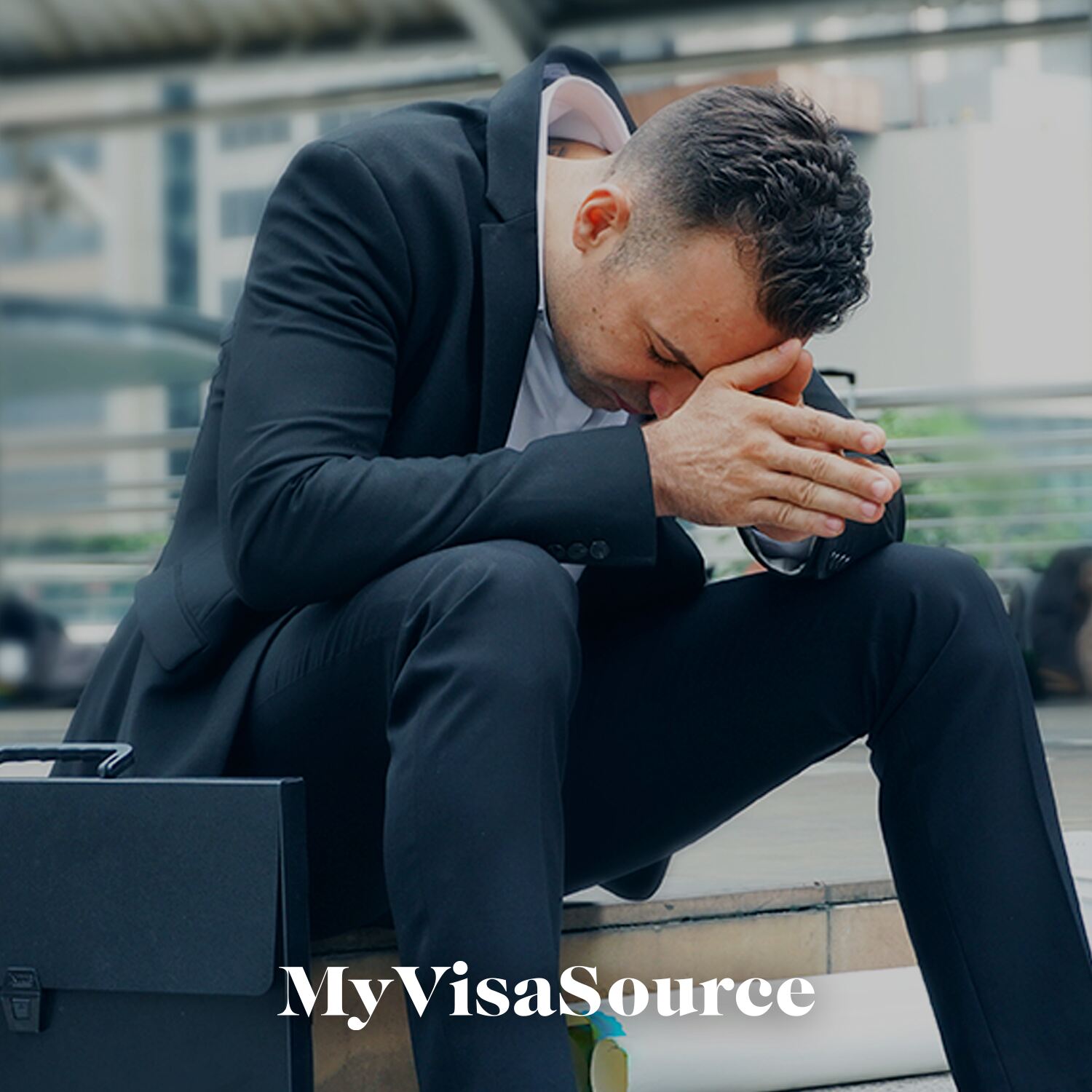 man-in-suit-in-an-upset-posture-my-visa-source