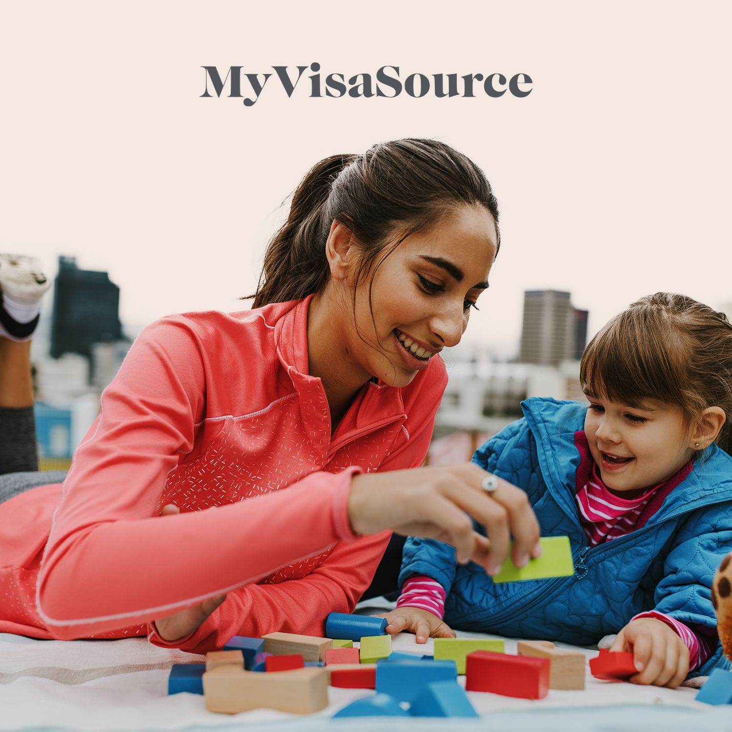 nanny playing blocks with a child my visa source