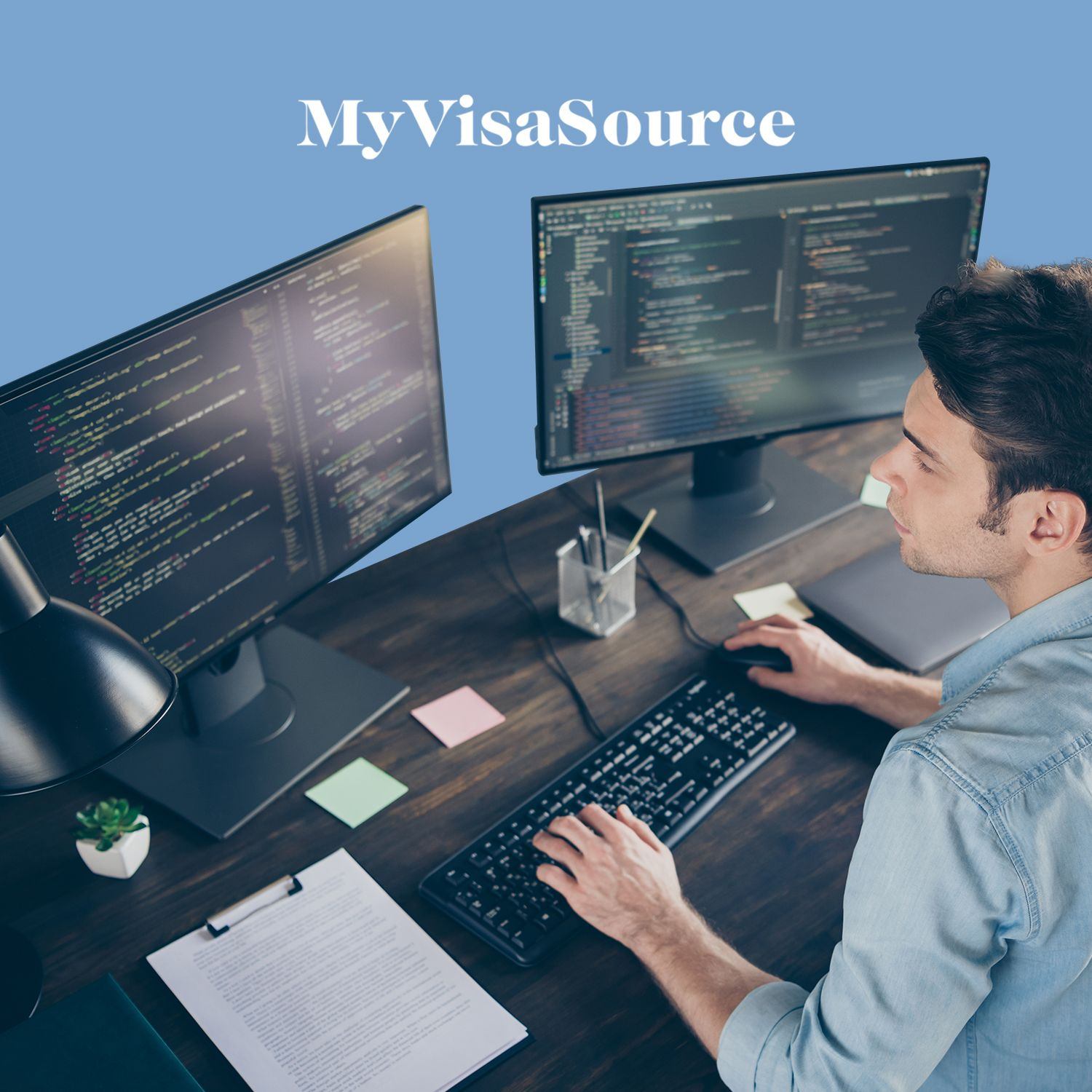 tech worker in front of multiple monitors my visa source
