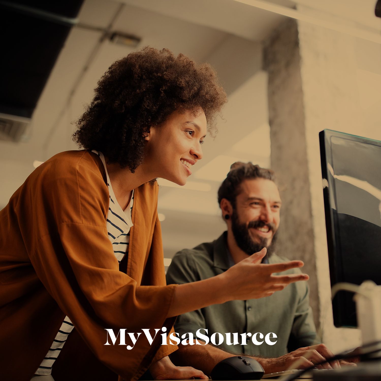 tech workers in front of a computer my visa source