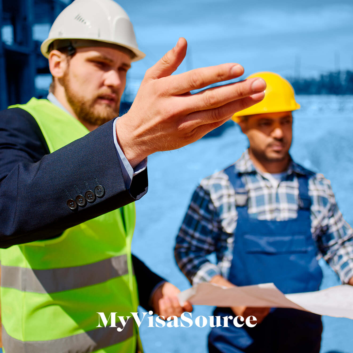 two construction workers on a job site