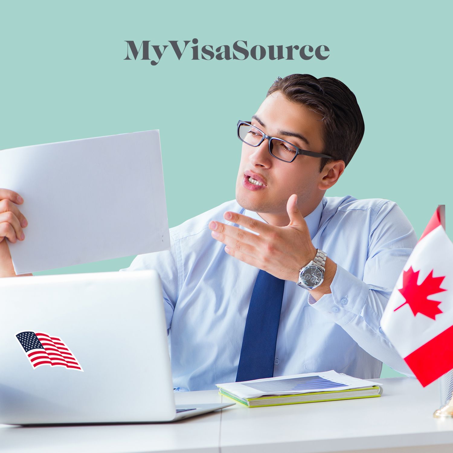 young professional working at his desk my visa source