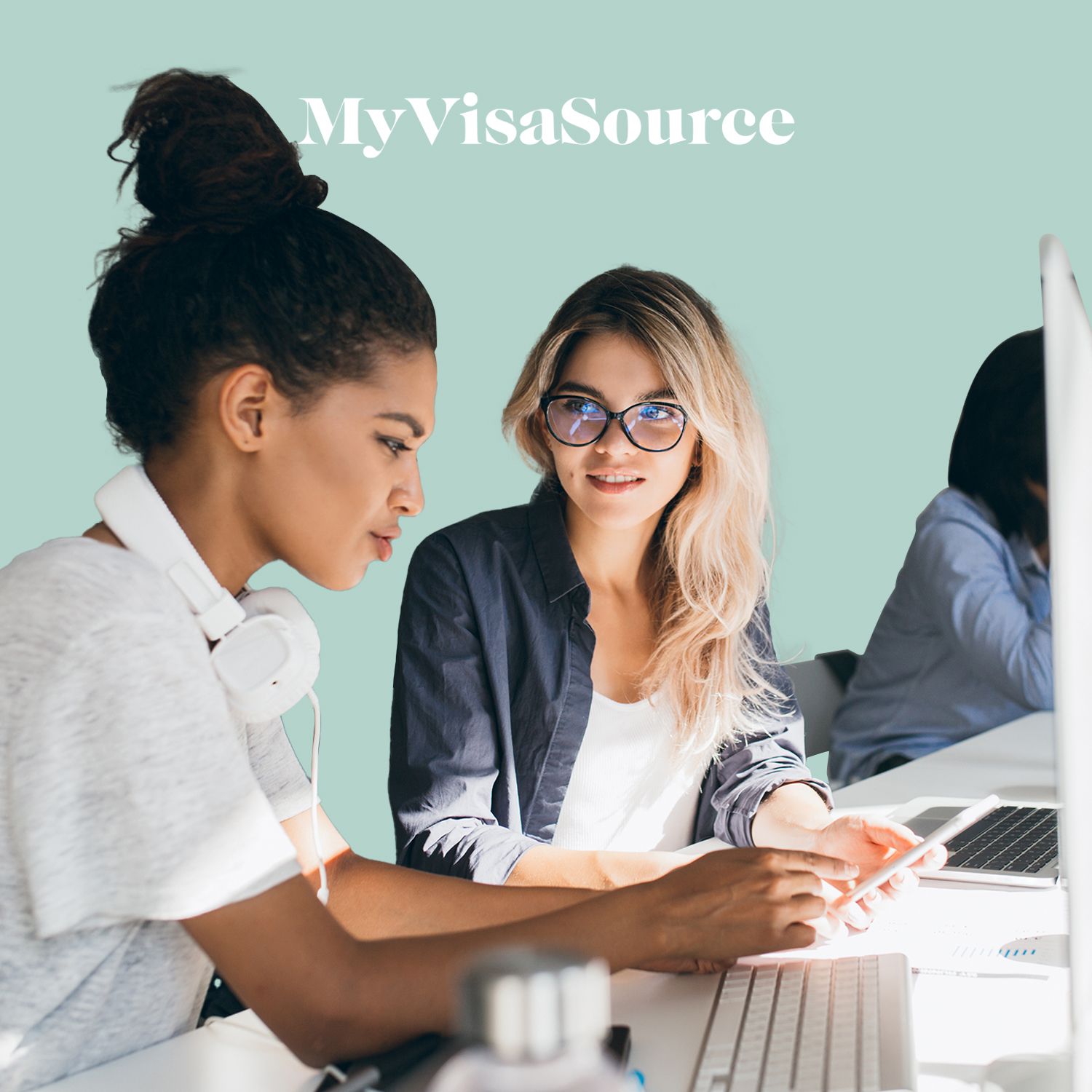 young women working together with computers my visa source