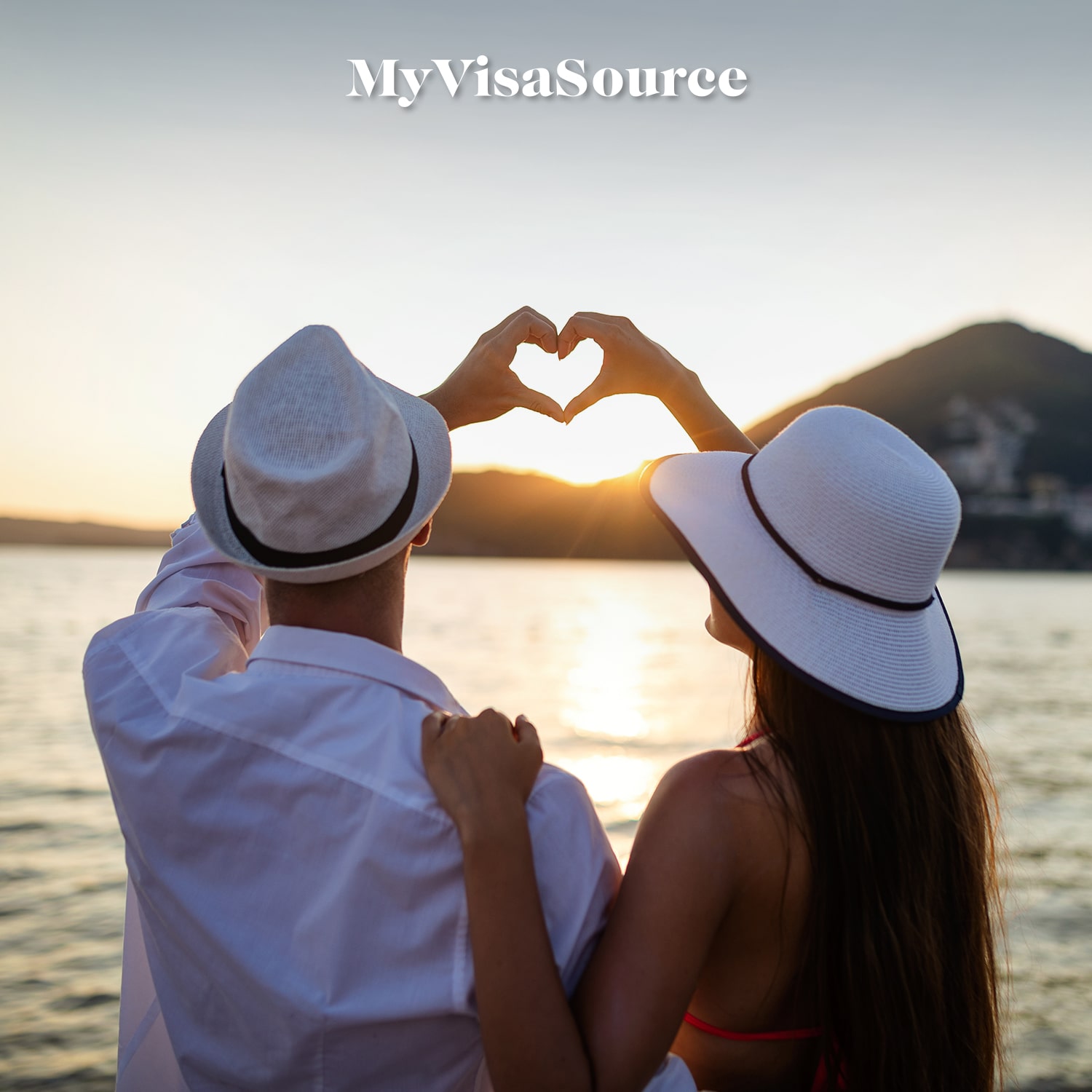 couple-on-vacation-hands-forming-heart-my-visa-source-min
