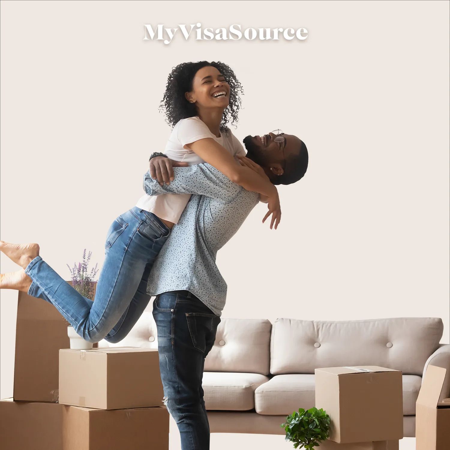 happy couple hugging after packing boxes to move with pink background by my visa source