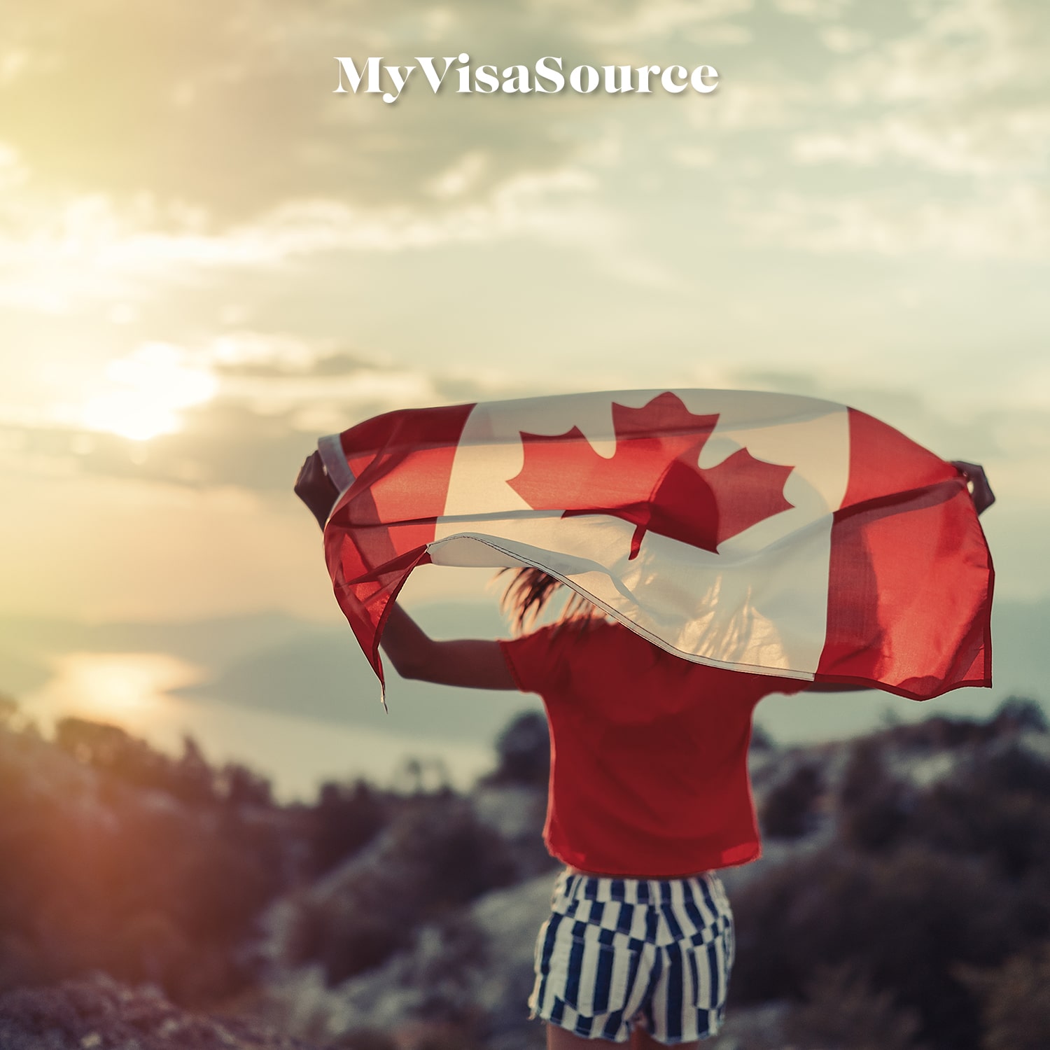 young-girl-holding-canadian-flag-my-visa-source-min
