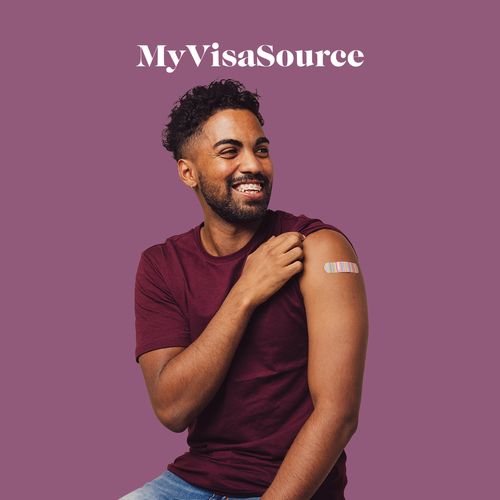 young man with vaccination bandaid on his arm my visa source